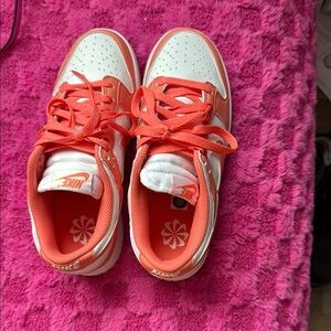 Nike Orange and White Athletic Shoes with Breathable Design
